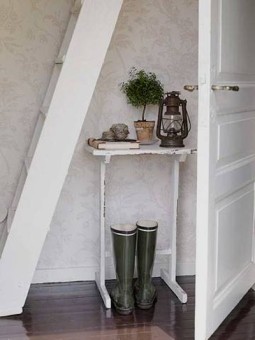 White end table, ladder and green rain boots via citified